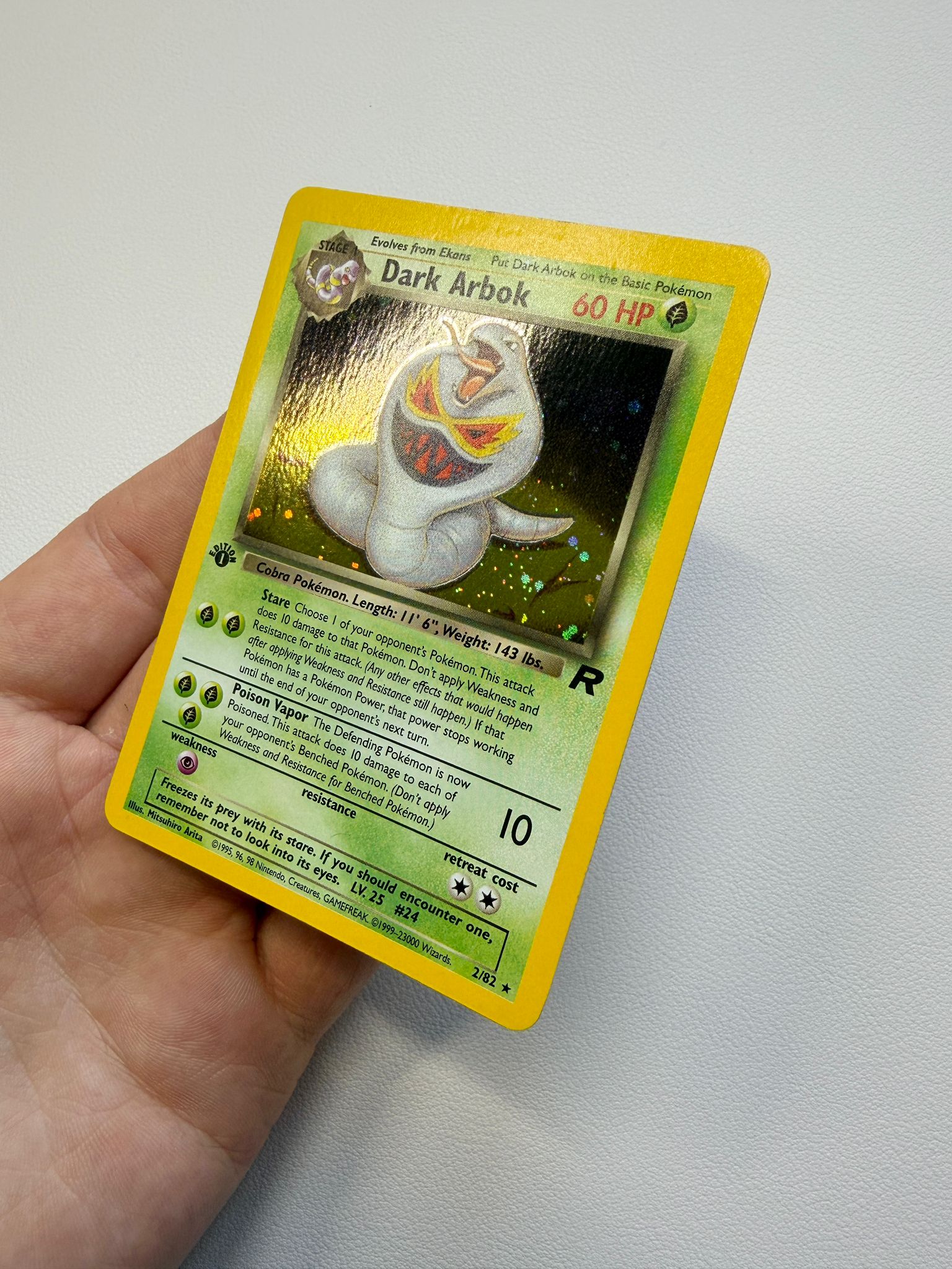 Dark Arbok Pokémon trading card after treatment at Kodap Cleans