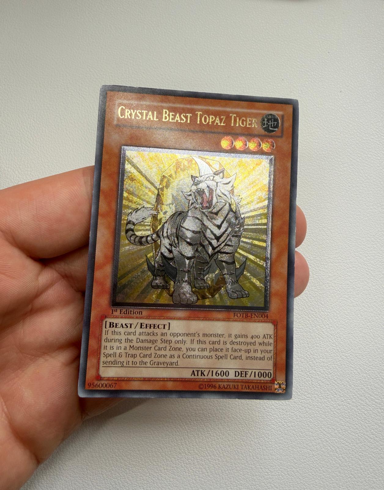 Crystal Beast Topaz Tiger Yu-Gi-Oh! trading card after cleaning and polishing by Kodap Cleans